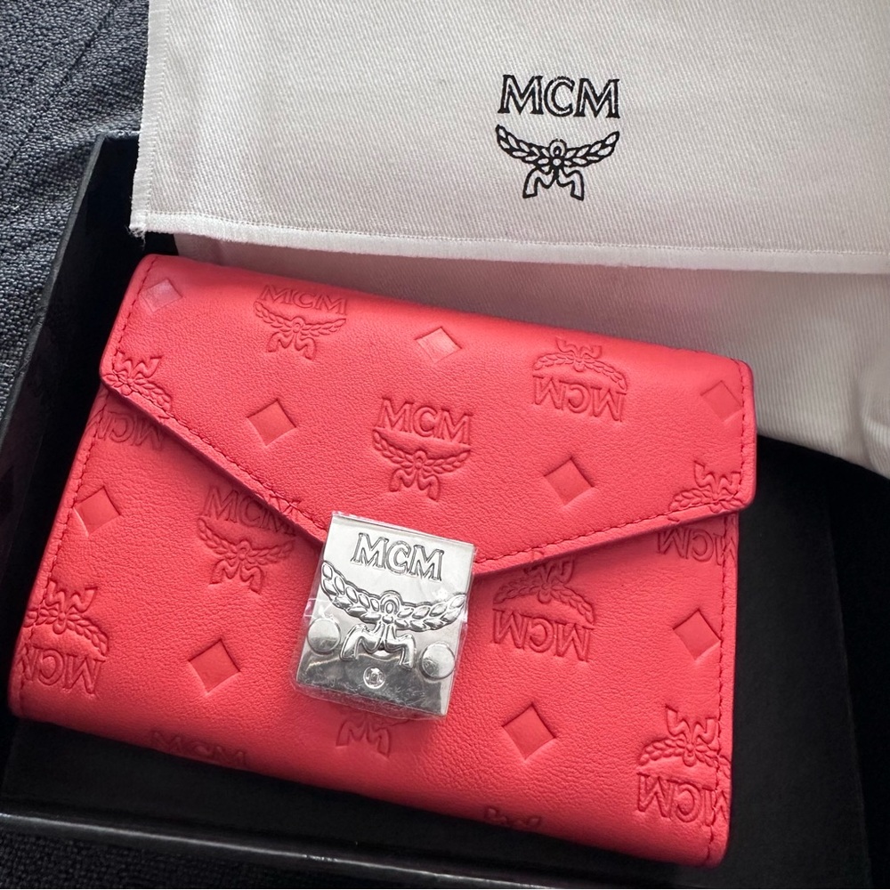 MCM Coral Pink Embossed Leather Wallet with Silver-Tone Lock